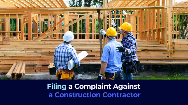 a picture of a group of men in front of wood construction with the title "Filing a Complaint Against a Construction Contractor